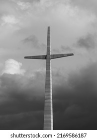 San Giovanni Rotondo, Apulia (Italy) - July 17, 2021: dramatic sky below the cross of Padre Pio's Church.