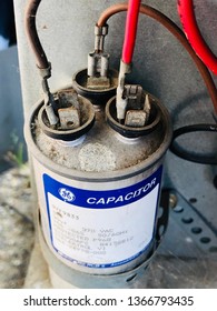 San Jose, CA - April 4, 2019: HVAC GE Capacitor that’s almost 20 years old. Not working unit. 30uF and 370VAC.