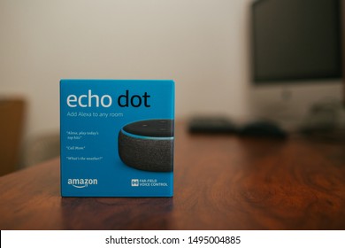 San Jose, CA - August 4, 2019: Amazon's Echo Dot voice assistant on a desk in an office. 
