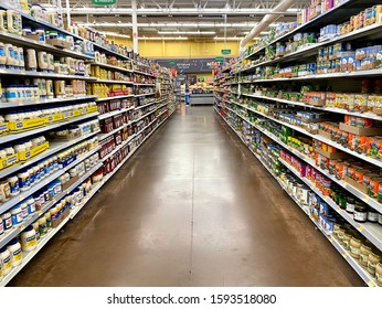 San Jose, CA - December 17, 2019: Supermarket Store Isle With Products Filling Shelves And No People Around.