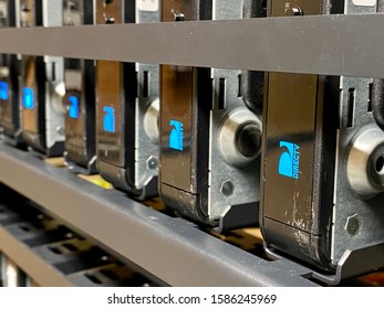 San Jose, CA - December 7, 2019: Used DirecTV Receivers On A Rack Inside Television Equipment Room. 