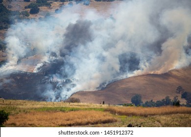 SAN JOSE, CA - JULY 15 2019: Summer fire in San Jose hills threatens homes and ranchland on July 15, 2019