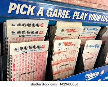 San Jose, CA - June 13, 2019: Variety of lottery quick pick tickets inside a convenience store.