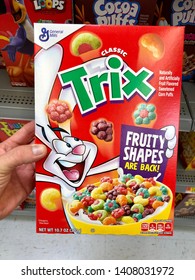 San Jose, CA - May 23, 2019: Classic TRIX Dry Corn Cereal By General Mills. Man Holding A New Box Inside A Grocery Store.