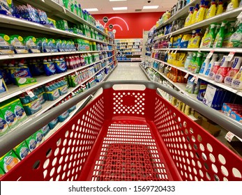 San Jose, CA - November 24, 2019: Wide View Of The Red Target Store Shopping Cart In The Middle Of An Isle, Ready To Shop.