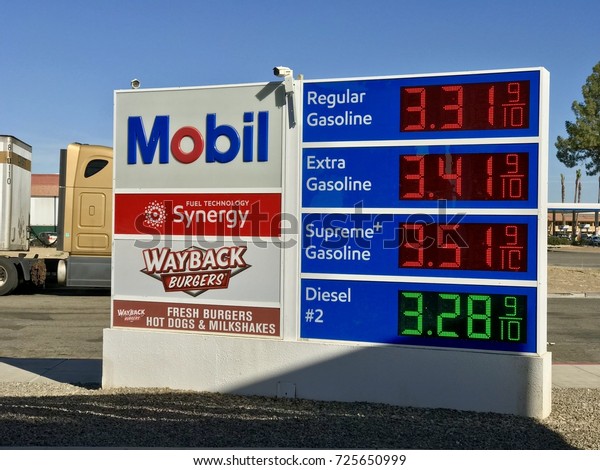 SAN JOSE, CA USA -\
CIRCA SEPTEMBER, 2017 : Mobil gas station with  current gas prices.\
Gas prices rise steadily across the country circa September 2017 in\
California