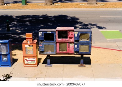 San  Jose, California, USA - July 2 2021: Old, Vandalized And Abandoned Newspaper Vending Machines Signaling Urban Decay And Malaise.