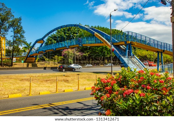 San Jose,\
Costa Rica - 1/24/2019:  A pedestrain overcrossing structure over a\
primary highway in San Jose, Costa\
Rica