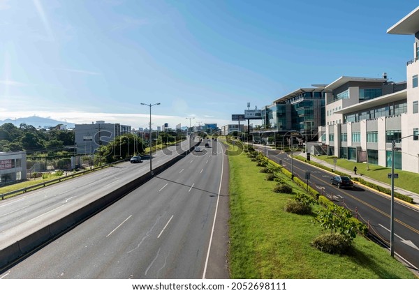 San Jose, Costa Rica. August\
8, 2021: Landscape with blue sky on the Próspero Fernández\
highway.