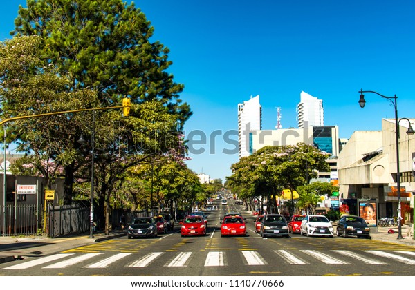 San Jose, Costa Rica. February 18,\
2018. Cars lined up at a red light in downtown San\
Jose