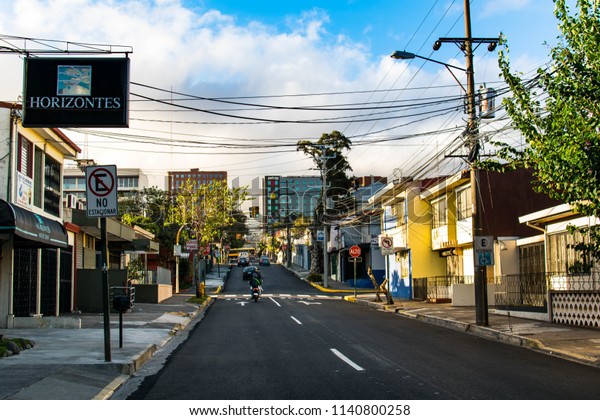 San Jose, Costa\
Rica. February 18, 2018. A few commuters begin their day in\
downtown San Jose, Costa\
Rica