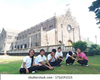San Jose, Philippines - June 18, 2017: Six altar servers outside the monastery