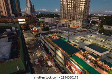 San Juan, Metro Manila, Philippines - May 2022: The Greenhills Shopping District At Sundown.