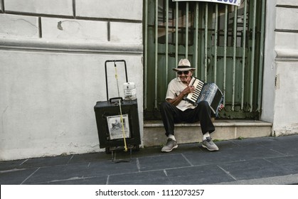 San Juan, Puerto Rico/USA - February 9, 2018: An Old Man Plays Music For Money With His Accordion On The Streets Of Old San Juan.  