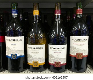 San Leandro, CA - April 08, 2016: Four bottles of Woodbridge wines by Robert Mondavi. Merlot, Chardonnay, Pinot Noir and a Cabernet Sauvignon.