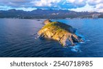 San Luis Island off the beaches of San Carlos, Sonora in Mexico. Its surface full of sahuaros contrasts with the calm blue of the Sea of Cortez.