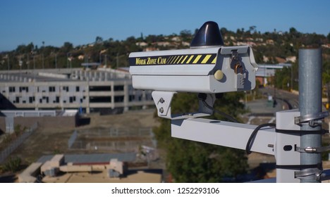 San Marcos, CA / USA - December 7, 2018: Rooftop Work Cam Security Camera Observes Progress On Parking Garage At Palomar College                              