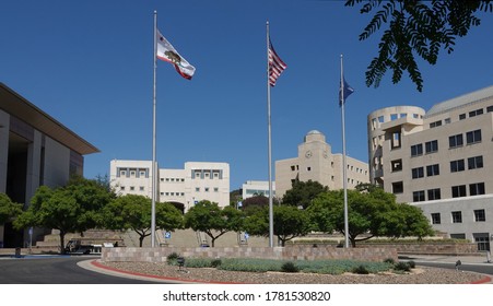 San Marcos, CA / USA - July 21, 2020: Flagpoles At Entrance To California State University San Marcos (CSUSM)