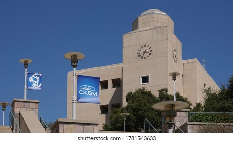 San Marcos, CA / USA - July 21, 2020: Logo Flag Of California State University San Marcos (CSUSM) With Academic Hall Building