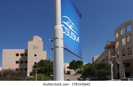 San Marcos, CA / USA - July 21, 2020: Logo Flag Of California State University San Marcos (CSUSM) With Academic Buildings