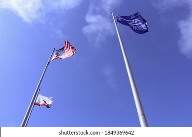 San Marcos, CA/USA - November 2020: CSUSM California State University San Marcos Flag With American Flag And California Flag