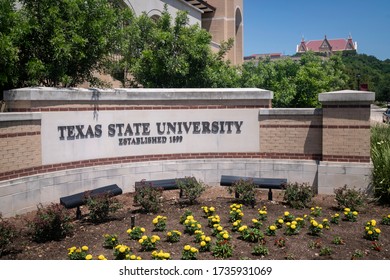 San Marcos, Texas - May 19 2020: Texas State University Welcome Sign With Old Main In The Distance