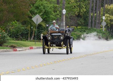 SAN MARINO, CA/USA - JUNE 12, 2016: Ca. 1912 Stanley Steam Car Cruising. The Stanley Motor Carriage Company Was An American Manufacturer Of Steam-engine Vehicles; It Operated From 1902 To 1924.