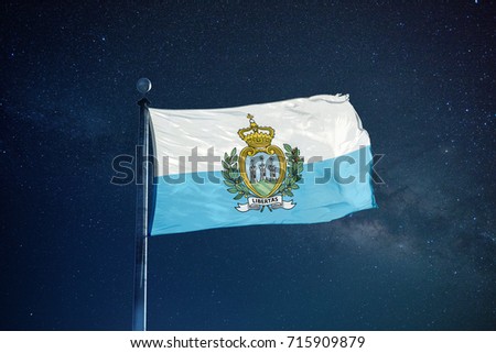 San Marino flag on the mast over milky way