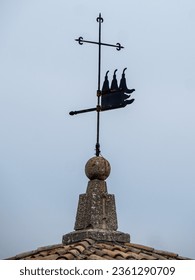 San Marino, San Marino - June 30 2023: Weathercock with the three towers symbols. San Marino is a European microstate and country enclaved by Italy.