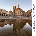 San Martin church in the beautiful Renaissance Plaza Mayor square in Trujillo, Extremadura, with prominent examples of architecture of the 15th and 16th centuries. No people.