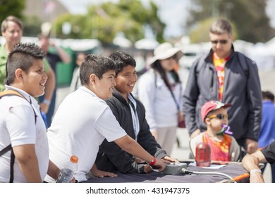 SAN MATEO, CA May 20 2016 - Two Boys Operate An Interactive Art Piece During The 11th Annual Bay Area Maker Faire At The San Mateo County Event Center.