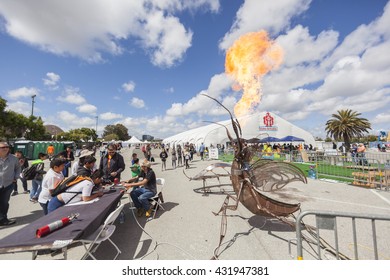 SAN MATEO, CA May 20 2016 - Two Boys Operate An Interactive Art Piece During The 11th Annual Bay Area Maker Faire At The San Mateo County Event Center.