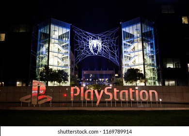 SAN MATEO, CALIFORNIA / USA - September 2, 2018: Marvel's SpiderMan Logo With A Web On The Sony PlayStation USA Office Building.