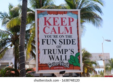 San Miguel De Cozumel, Mexico - January 28 2020: Humorous Sign Referencing The U.S. - Mexico Border Wall Outside Senor Frog's At Punta Langosta