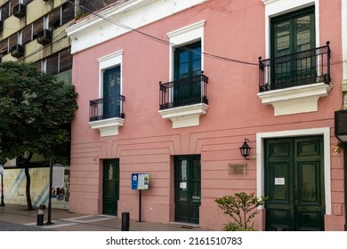 San Miguel de Tucuman, Tucuman, Argentina. 02-13-2022, Colonial style building facade with symmetrical windows.