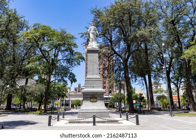 San Miguel de Tucuman, Tucuman, Argentina. 02-12-2022. Statue in the city square with trees on a sunny day.