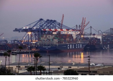 SAN PEDRO, CALIFORNIA - DEC 6, 2017 - Container Ship And Overhead Cranes On The Dock Of Long Beach Port, San Pedro, California