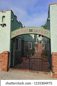 San Pedro, California USA - August 12, 2018: Entrance Gate To Courtyard Area Of A Bungalow Court Apartment Complex In Rustic Spanish Stucco Hacienda Style