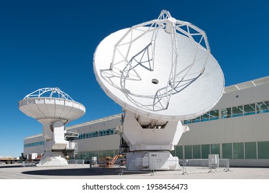 San Pedro de Atacama, Atacama Desert, ALMA Base Camp, Chile – ALMA Base Camp infrastructure and machinery with large radio telescopes.