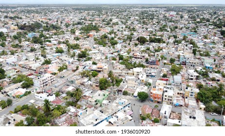 san pedro de macoris, dominican republic - march 13 2021 - aerial shot of the neighborhood in san pedro de macoris near the baseball stadium.