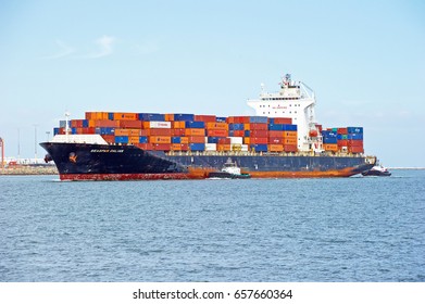 SAN PEDRO/CALIFORNIA - JUNE 10, 2017: Seaspan Dalian container ship sailing under the flag of Hong Kong arrives at the Port of Los Angeles, the largest port in America. San Pedro, California USA