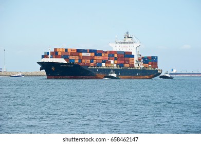 SAN PEDRO/CALIFORNIA - JUNE 10, 2017: Seaspan Dalian container ship sailing under the flag of Hong Kong arrives at the Port of Los Angeles, the largest port in America. San Pedro, California USA