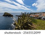 San Roque cliff in the ocean in Sao Roque town Azores San Miguel island Portugal