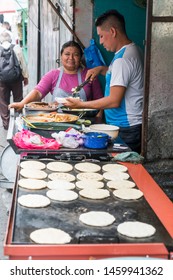 San Salvador, El Salvador - May 21, 2019: Local People Sell Pupusas At Market, Typical Dish From El Salvador