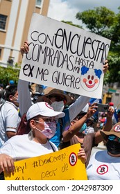 San Salvador, El Salvador - September 15th, 2021: Protesters Walk In The Streets Of The City Against The Bitcoin Politics Of Current President Nayib Bukele.