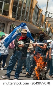 San Salvador, El Salvador - September 15th, 2021: Protesters Burn A Piñata With The Face Of Current President Nayib Bukele.