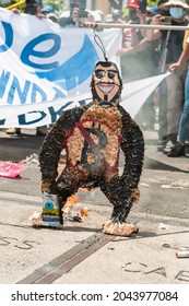 San Salvador, El Salvador - September 15th, 2021: Protesters Burn A Piñata With The Face Of Current President Nayib Bukele.