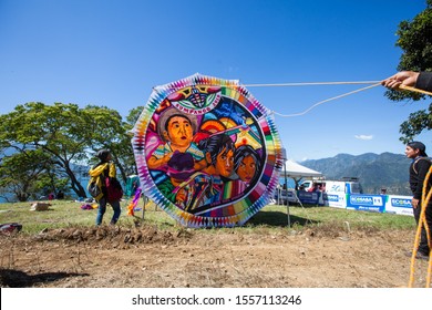 San Andrés Semetabaj, Sololá Department/Guatemala - November 9, 2019: A Group Called Luna Del Pueblo, Lifts Their Kite For People To View At The Yearly Kite Festival.