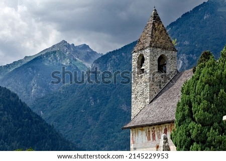 The San Vigilio church in Pinzolo and Cima Lancia in Presanella. Rendena Valley, Trento province, Trentino Alto-Adige, Italy, Europe.