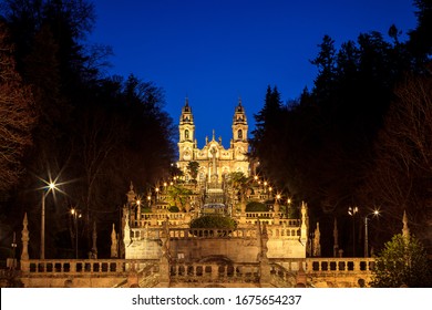 Sanctuary of Nossa Senhora dos Remedios and monumental staircase in Lamego, Portugal, at dusk.